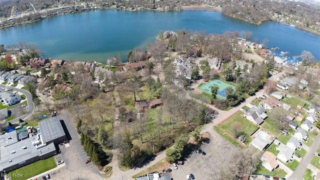 birds eye view of property featuring a residential view and a water view