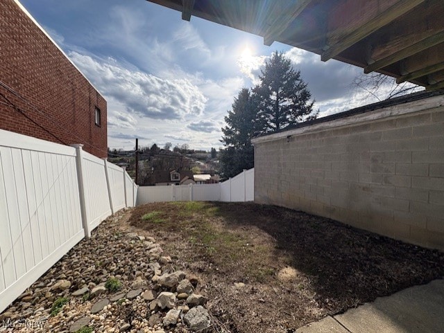 view of yard featuring a fenced backyard