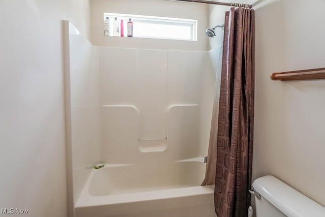2500 Marlborough Dr, Uniontown, OH 44685 - full bathroom with a shower with shower curtain and toilet