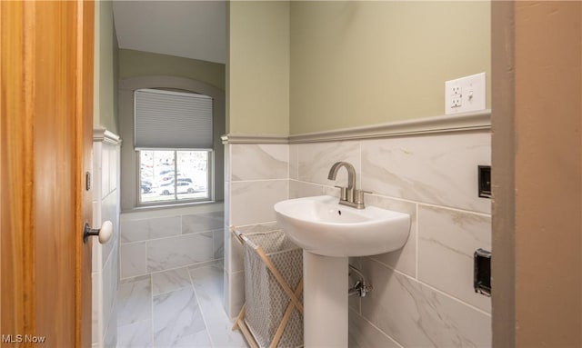 203 W 6th St, Dover, OH 44622 - bathroom featuring tile walls and marble finish floor