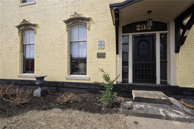 203 W 6th St, Dover, OH 44622 - doorway to property with brick siding