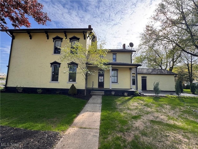 203 W 6th St, Dover, OH 44622 - view of front of property with covered porch and a front yard