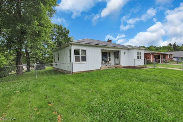 507 Beacon Rd, Newark, OH 43055 - rear view of property with a chimney, a gate, and metal roof