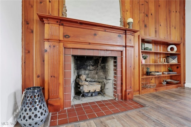 507 Beacon Rd, Newark, OH 43055 - detailed view of a tiled fireplace and wood finished floors