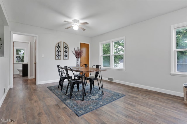 507 Beacon Rd, Newark, OH 43055 - dining room featuring ceiling fan, dark wood-type flooring, and baseboards
