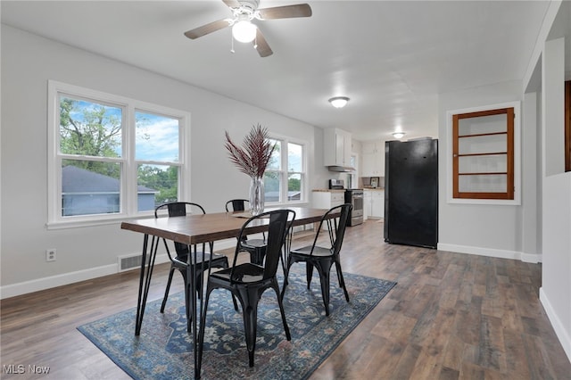 507 Beacon Rd, Newark, OH 43055 - dining area with baseboards, dark wood-style floors, and a ceiling fan