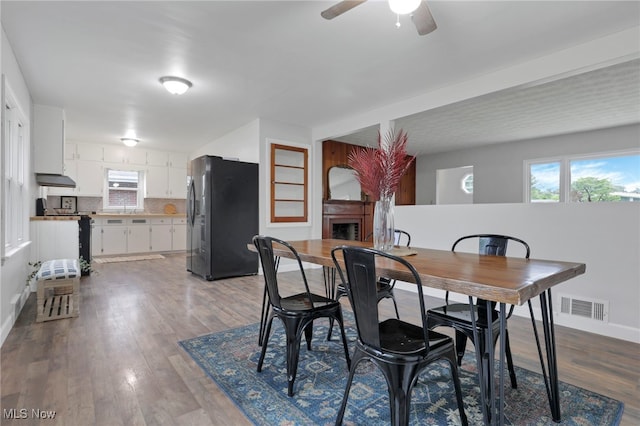 507 Beacon Rd, Newark, OH 43055 - dining space featuring a ceiling fan, dark wood-type flooring, and baseboards