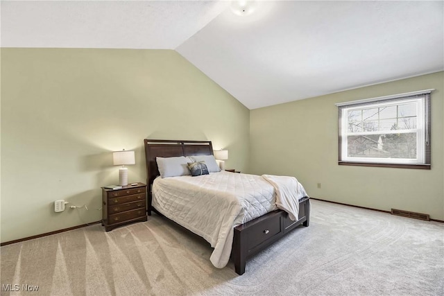 21242 Jonathan Dr, Strongsville, OH 44149 - bedroom with baseboards, carpet flooring, visible vents, and vaulted ceiling