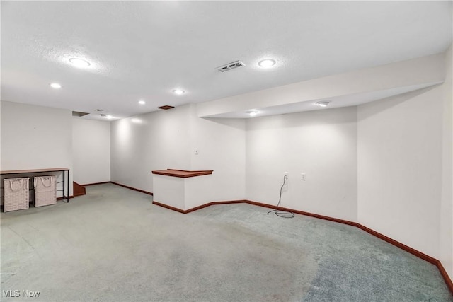 21242 Jonathan Dr, Strongsville, OH 44149 - finished basement with carpet, a textured ceiling, baseboards, visible vents, and recessed lighting