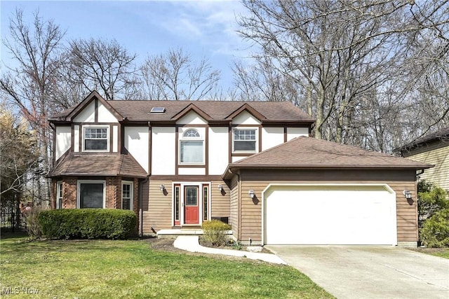21242 Jonathan Dr, Strongsville, OH 44149 - english style home with a shingled roof, a front yard, a garage, and concrete driveway