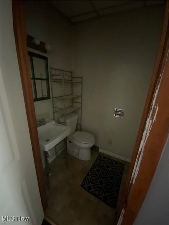 515 E Sixth St, East Liverpool, OH 43920 - bathroom with baseboards and toilet
