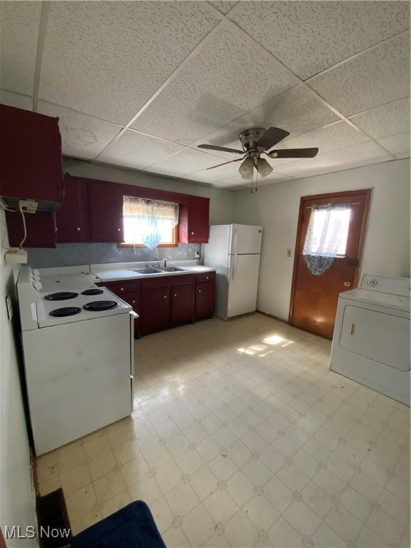 515 E Sixth St, East Liverpool, OH 43920 - kitchen featuring ceiling fan, light floors, washer / dryer, and white appliances