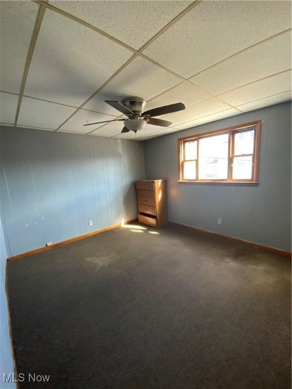 515 E Sixth St, East Liverpool, OH 43920 - unfurnished room featuring baseboards, ceiling fan, a drop ceiling, and carpet