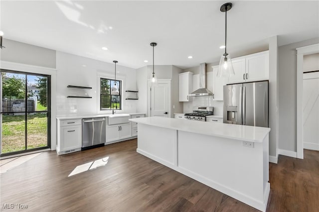 260 Michaels Ct, Cortland, OH 44410 - kitchen with stainless steel appliances, wall chimney range hood, open shelves, backsplash, and a kitchen island
