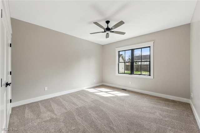 260 Michaels Ct, Cortland, OH 44410 - unfurnished room with carpet, baseboards, and ceiling fan