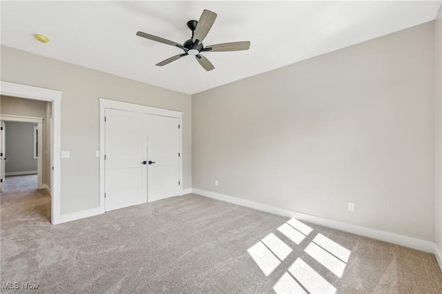 260 Michaels Ct, Cortland, OH 44410 - unfurnished bedroom featuring carpet flooring, baseboards, a closet, and a ceiling fan