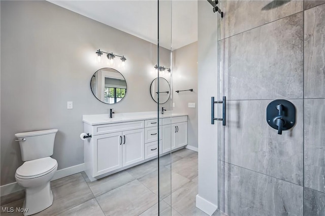 260 Michaels Ct, Cortland, OH 44410 - full bathroom featuring a stall shower, double vanity, baseboards, and toilet