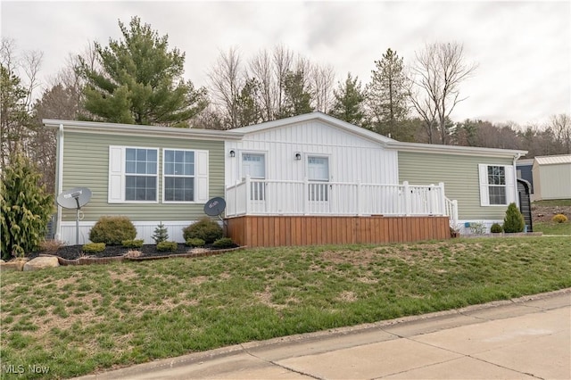 2409 Chelsea Dr SW, Canton, OH 44706 - manufactured / mobile home with a front yard