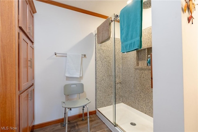 2409 Chelsea Dr SW, Canton, OH 44706 - full bath with a shower stall, baseboards, and wood finished floors