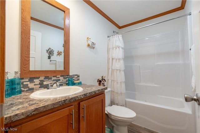 2409 Chelsea Dr SW, Canton, OH 44706 - full bathroom with vanity, crown molding, toilet, backsplash, and shower / bath combo with shower curtain