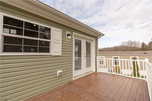 2409 Chelsea Dr SW, Canton, OH 44706 - wooden deck with french doors