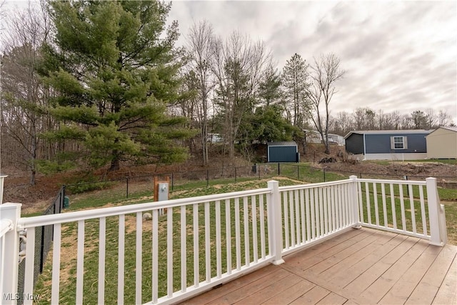 2409 Chelsea Dr SW, Canton, OH 44706 - deck with a fenced backyard and a lawn