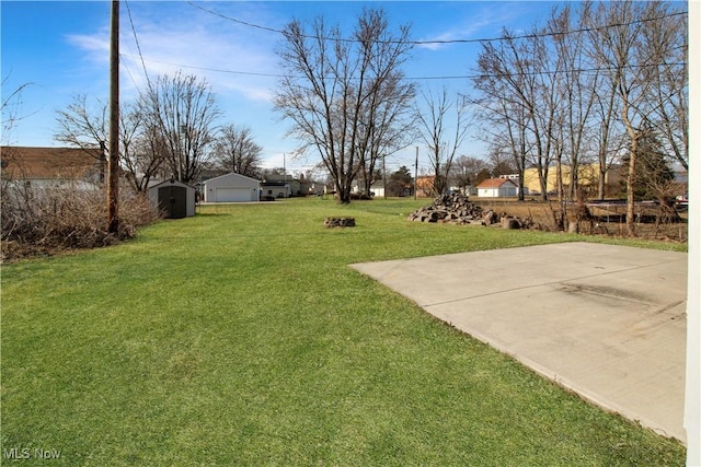 424 Short Prt, Clinton, OH 43452 - view of yard featuring an outbuilding and a garage