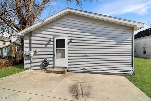424 Short Prt, Clinton, OH 43452 - back of property featuring a yard and a patio area