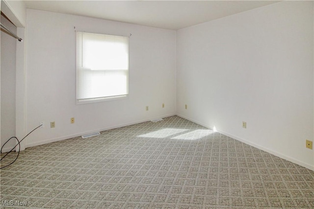 424 Short Prt, Clinton, OH 43452 - unfurnished room featuring baseboards, light colored carpet, and visible vents