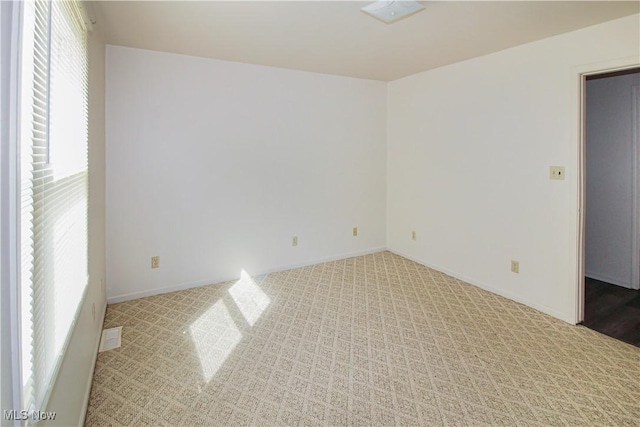 424 Short Prt, Clinton, OH 43452 - carpeted spare room with baseboards and visible vents