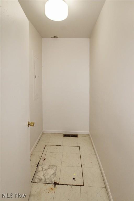 424 Short Prt, Clinton, OH 43452 - corridor featuring baseboards and light tile patterned flooring