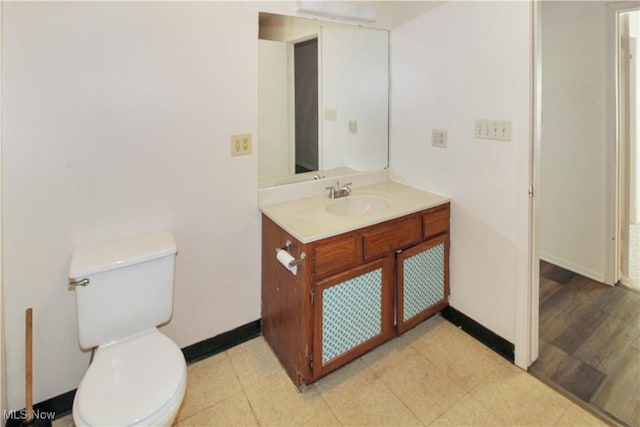 424 Short Prt, Clinton, OH 43452 - half bath featuring baseboards, toilet, and vanity