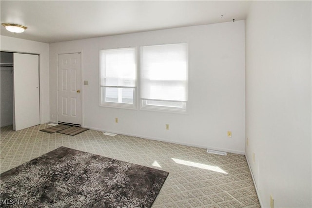 424 Short Prt, Clinton, OH 43452 - foyer entrance featuring baseboards, carpet flooring, and visible vents