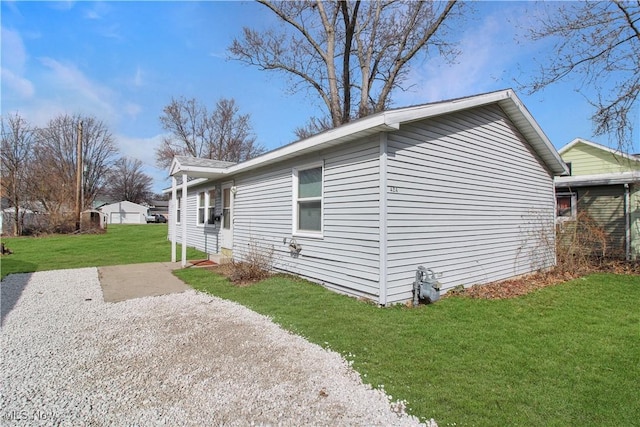 424 Short Prt, Clinton, OH 43452 - view of side of property featuring a lawn