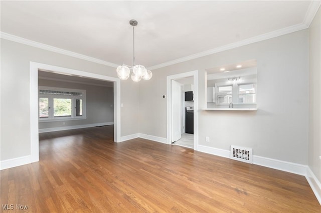 3459 Helen Rd, Shaker Heights, OH 44122 - unfurnished dining area with ornamental molding, baseboards, a chandelier, visible vents, and wood finished floors