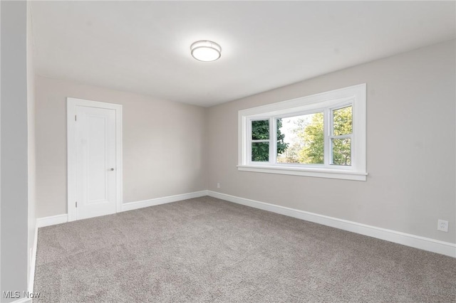 3459 Helen Rd, Shaker Heights, OH 44122 - carpeted empty room featuring baseboards