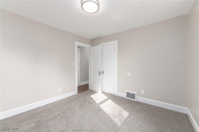 3459 Helen Rd, Shaker Heights, OH 44122 - carpeted empty room featuring baseboards and visible vents