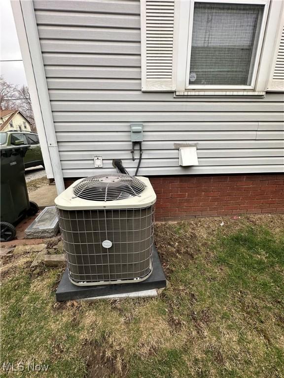 details with central air condition unit and crawl space
