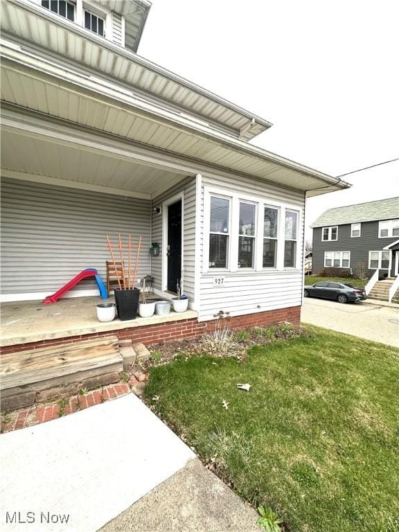 exterior space with a lawn