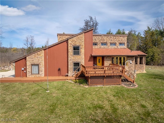 3871 Foskett Rd, Medina, OH 44256 - back of property with stone siding, a deck, and a yard