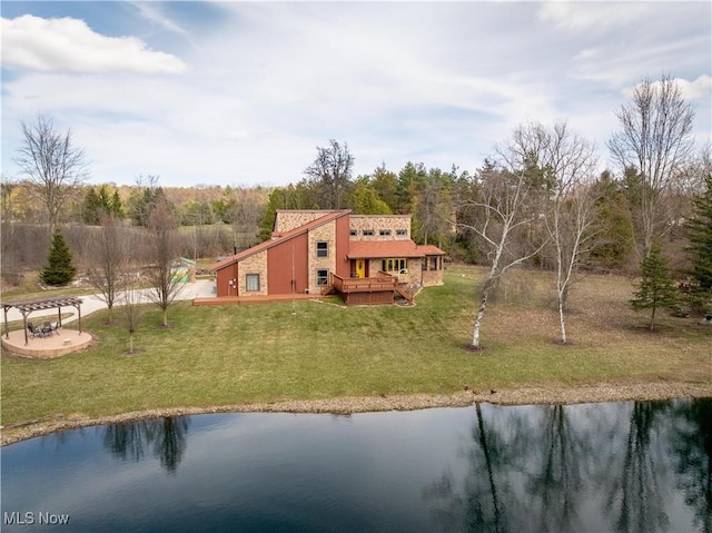 3871 Foskett Rd, Medina, OH 44256 - rear view of house featuring a deck with water view, a forest view, and a yard