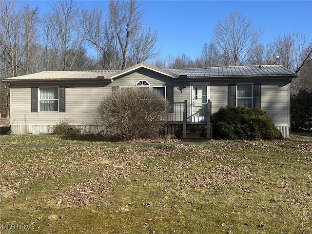 7280 US Route 322, Williamsfield, OH 44093 - manufactured / mobile home with metal roof, a front lawn, and a wooden deck