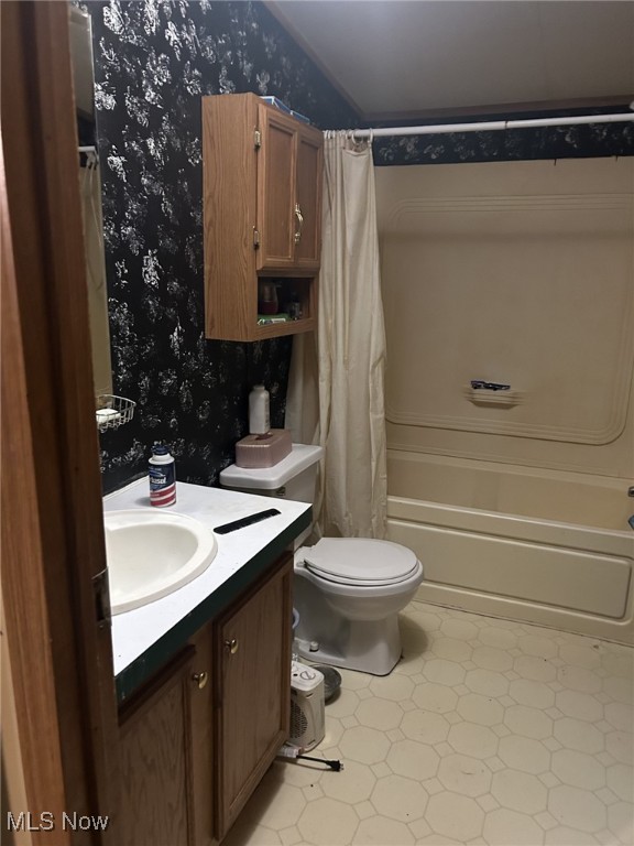 7280 US Route 322, Williamsfield, OH 44093 - full bathroom featuring wallpapered walls, shower / bath combo, toilet, and vanity