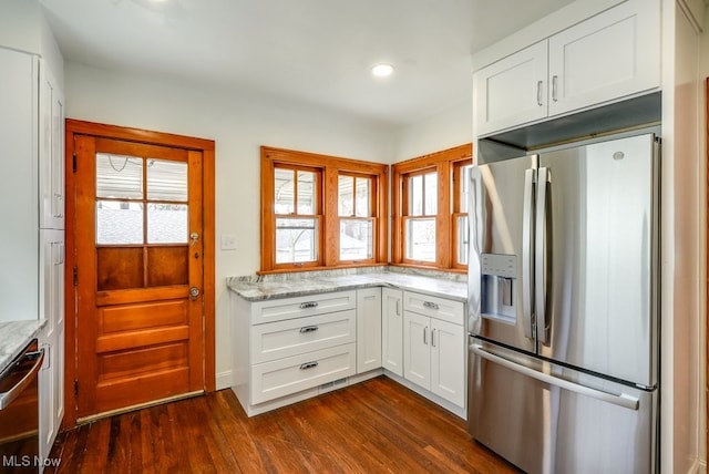 3596 W 155th St, Cleveland, OH 44111 - kitchen with stainless steel appliances, plenty of natural light, dark wood-type flooring, light stone countertops, and recessed lighting