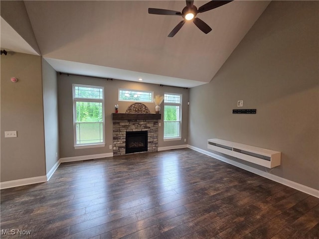 226 Hidden Glen Trl, Chardon, OH 44024 - unfurnished living room with plenty of natural light, dark wood finished floors, a ceiling fan, and high vaulted ceiling