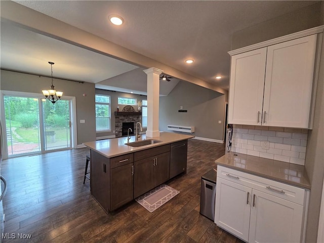 226 Hidden Glen Trl, Chardon, OH 44024 - kitchen featuring open floor plan, dishwasher, dark wood-style floors, white cabinets, and recessed lighting