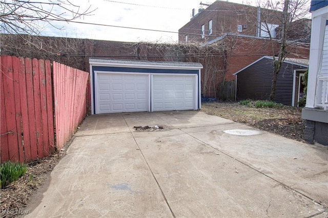 detached garage with fence