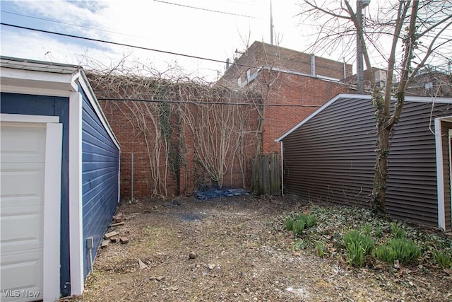 view of yard with a garage