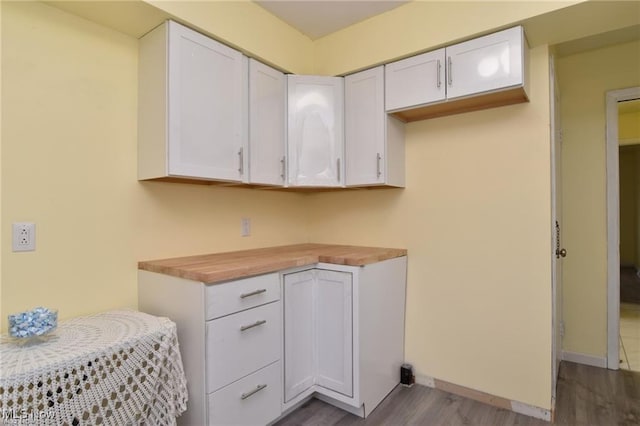 210 Magnolia Ave, Northfield, OH 44067 - laundry room with baseboards and dark wood-style flooring