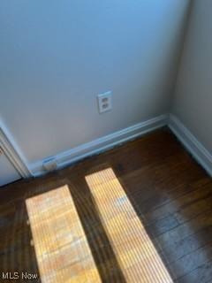 room details with wood finished floors and baseboards